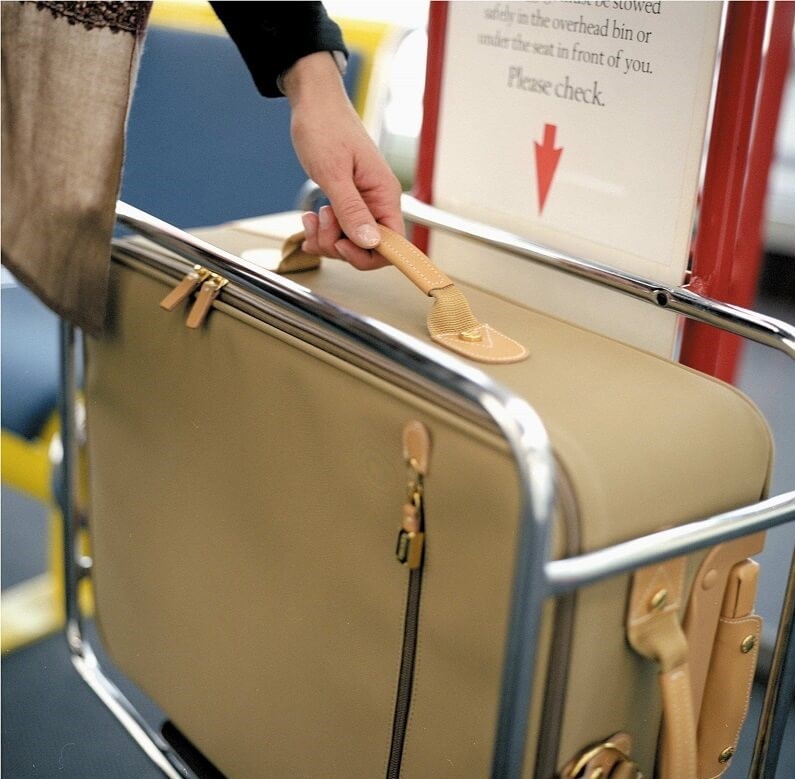 7kg hành lý xách tay có bao gồm túi xách không-hành lý xách tay có bị cân không?